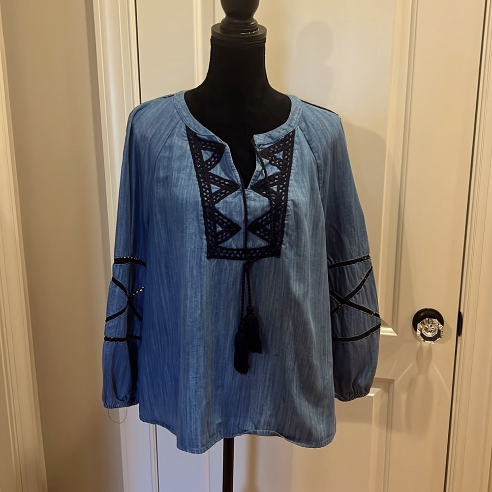 Light denim look blouse with black crochet detail
